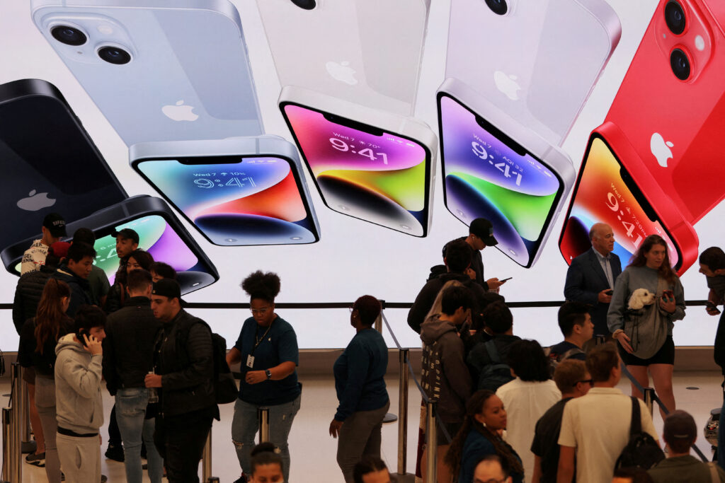 Apple iPhone sales inch up, bolstering results amid shaky economy