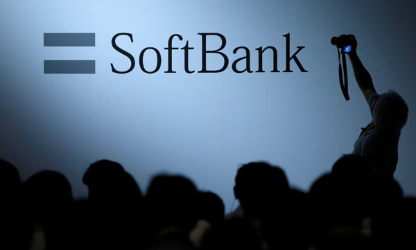 SoftBank Group Corp said it would receive shares in telco T-Mobile US worth some $7.59 billion at no additional cost, driving the Japanese conglomerate's shares up 5%.