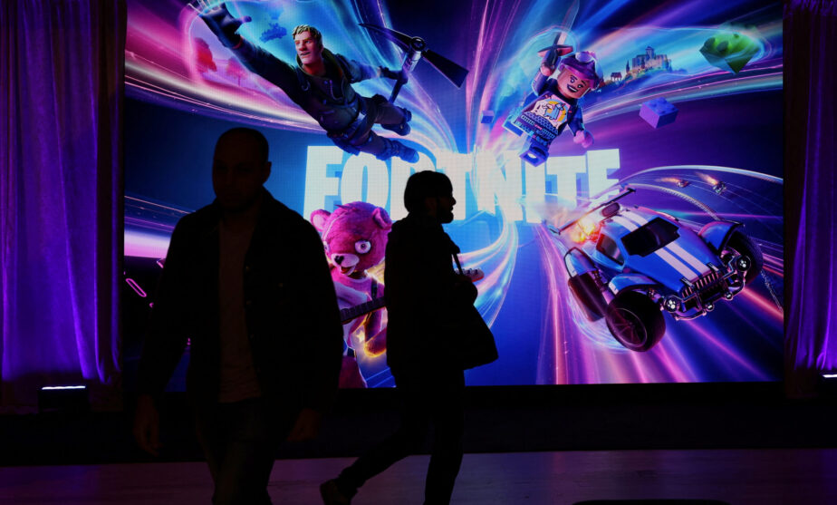 Under pressure from European regulators, Apple took a step back in its feud with Epic Games on Friday, clearing the way for Epic to put its own game store on iPhones and iPads in Europe.