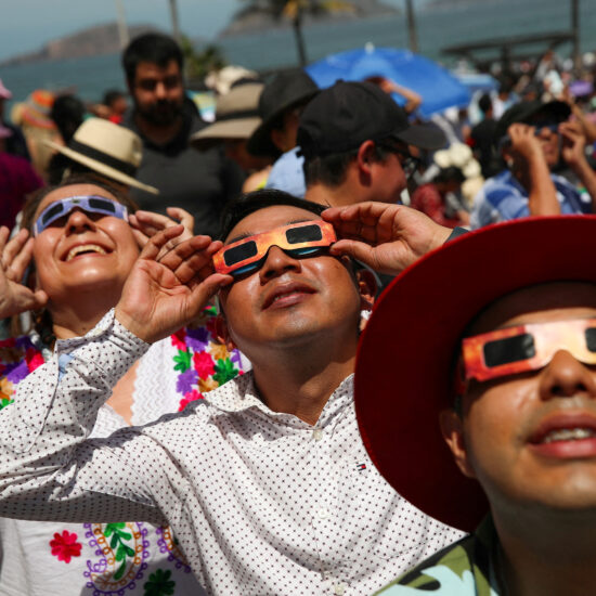 Total solar eclipse: North Americans celebrate with cheers, music and matrimony