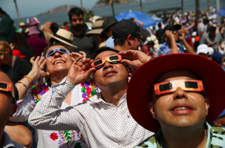 Total solar eclipse: North Americans celebrate with cheers, music and matrimony