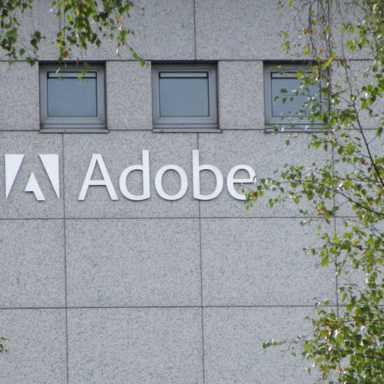 Adobe surges as AI optimism fuels annual revenue forecast