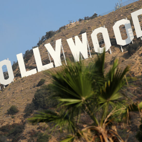 Hollywood workers union reaches pay, AI-use deal with top studios