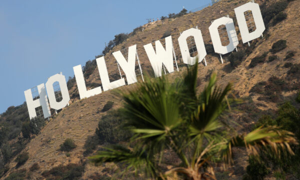 Hollywood workers union reaches pay, AI-use deal with top studios