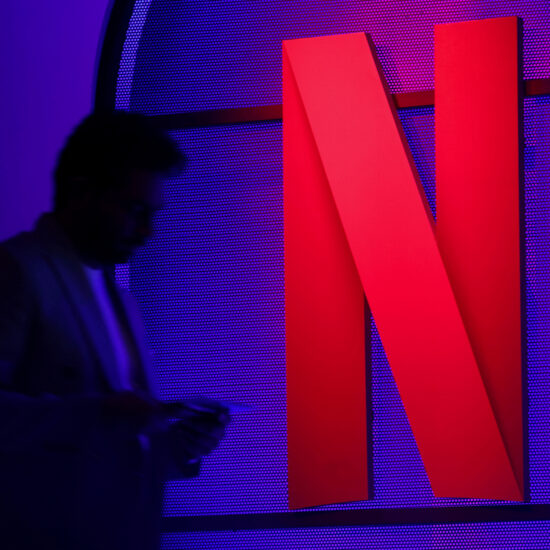 Netflix beats subscriber targets, cautions on ad growth