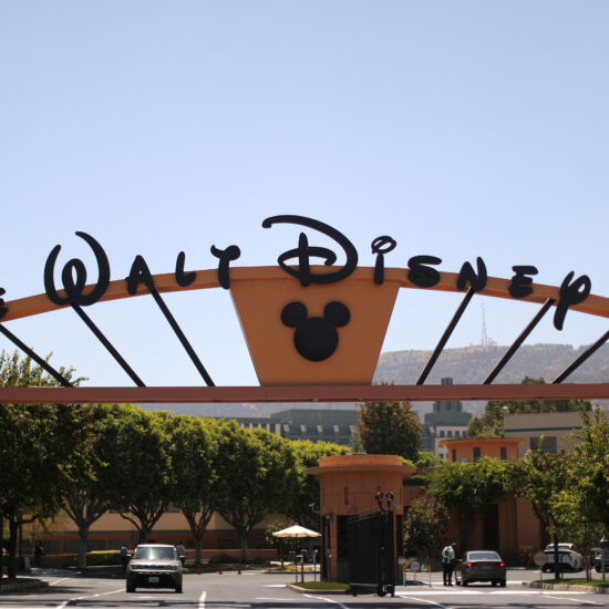 Walt Disney warns theme park revenue to fall, profit slips