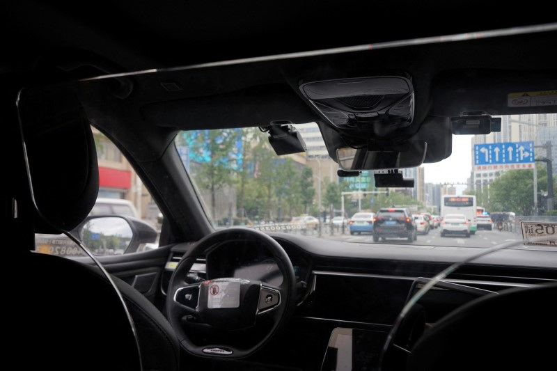 China's drivers fret as robotaxis pick up pace - and passengers