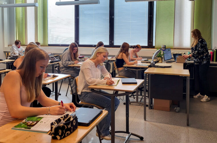 Books in, screens out: some Finnish pupils go back to paper after tech push