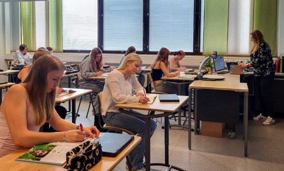 Books in, screens out: some Finnish pupils go back to paper after tech push